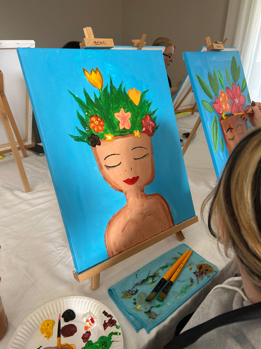 painting of lady with flower head piece