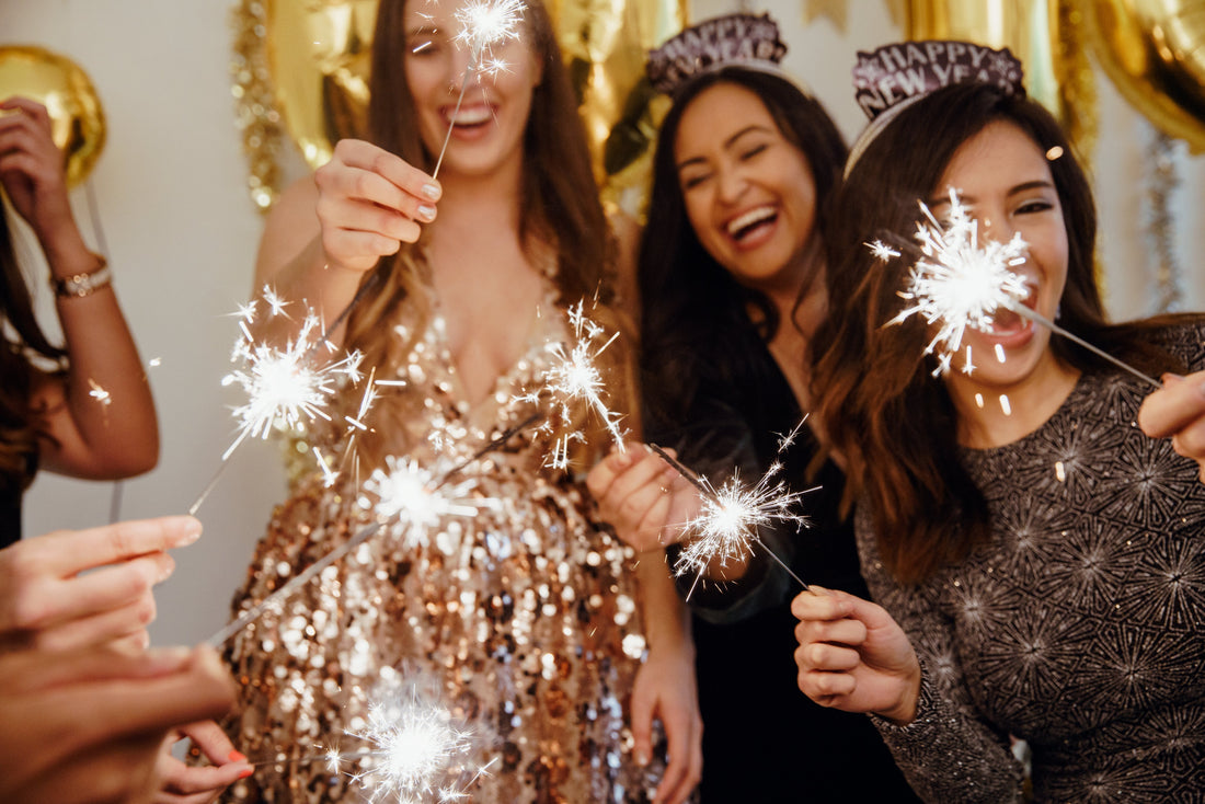 girls with sparklers having fun