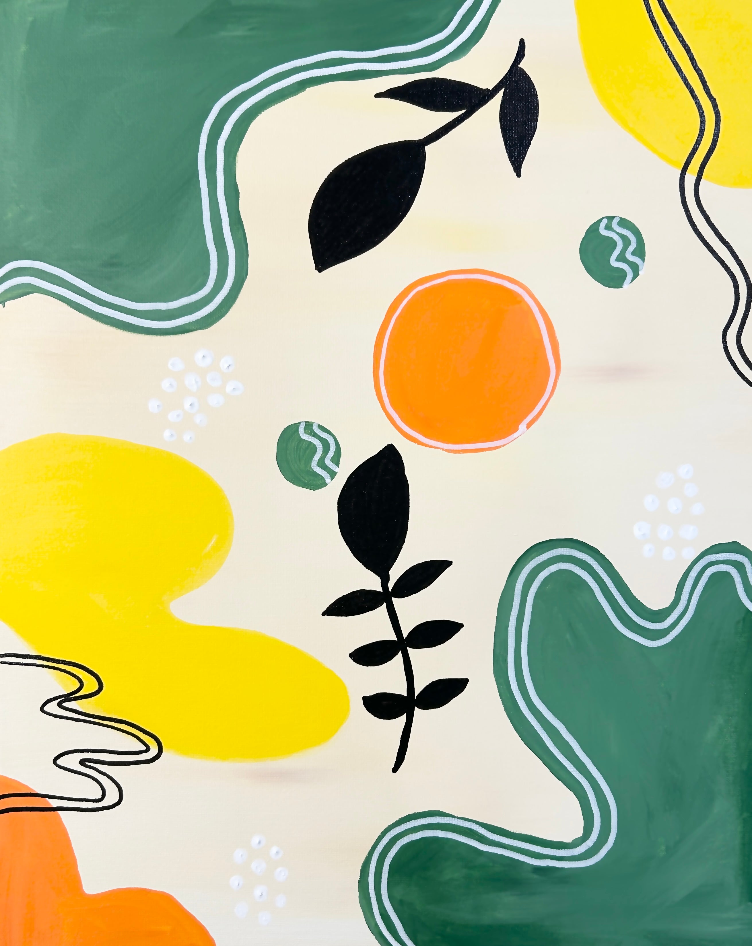 acrylic painting of an abstract design with green swirls, a large orange dot, yellow shapes and black leaf shaped objects